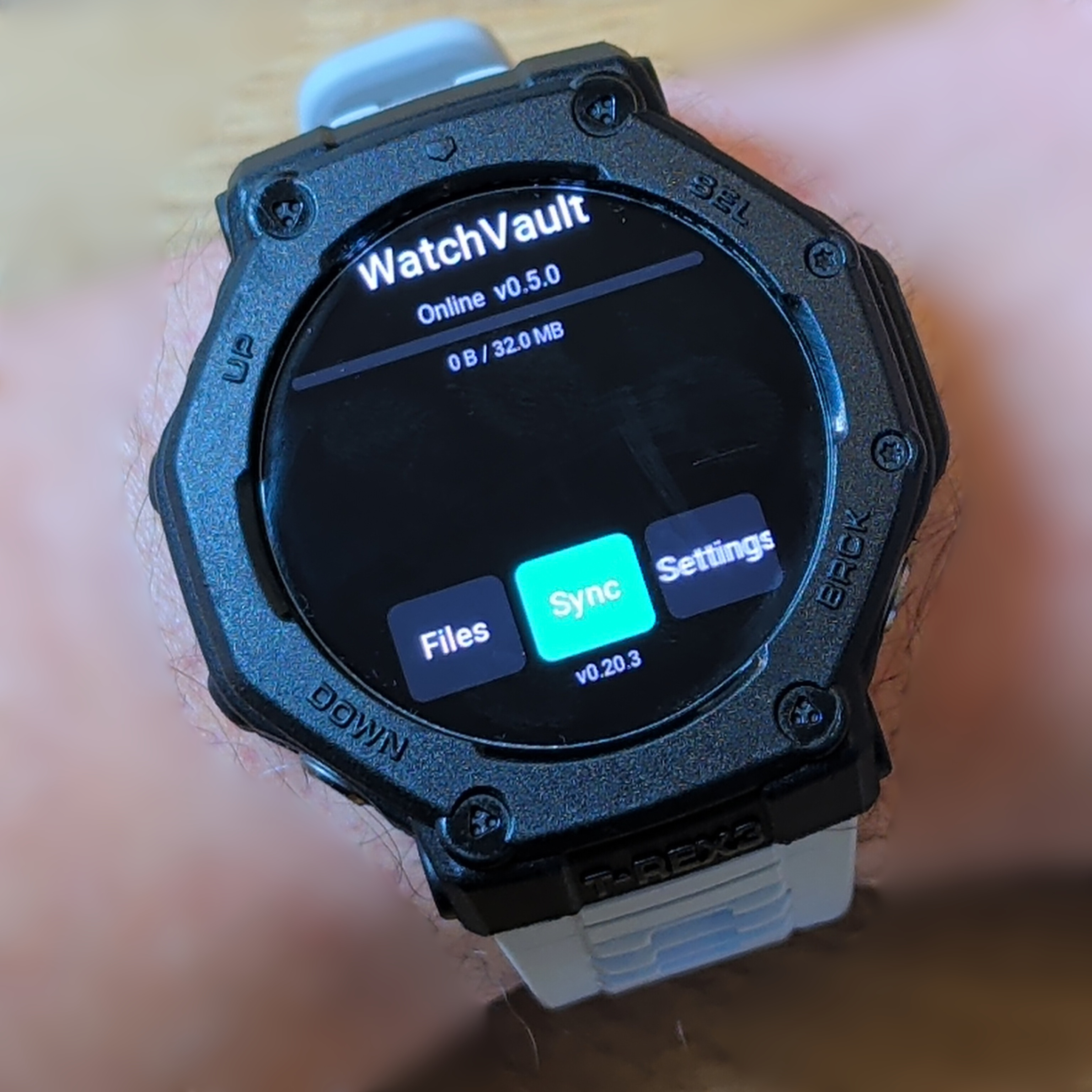 WatchVault home screen on the Amazfit T-Rex 3 — real device photo, release 0.20.3.